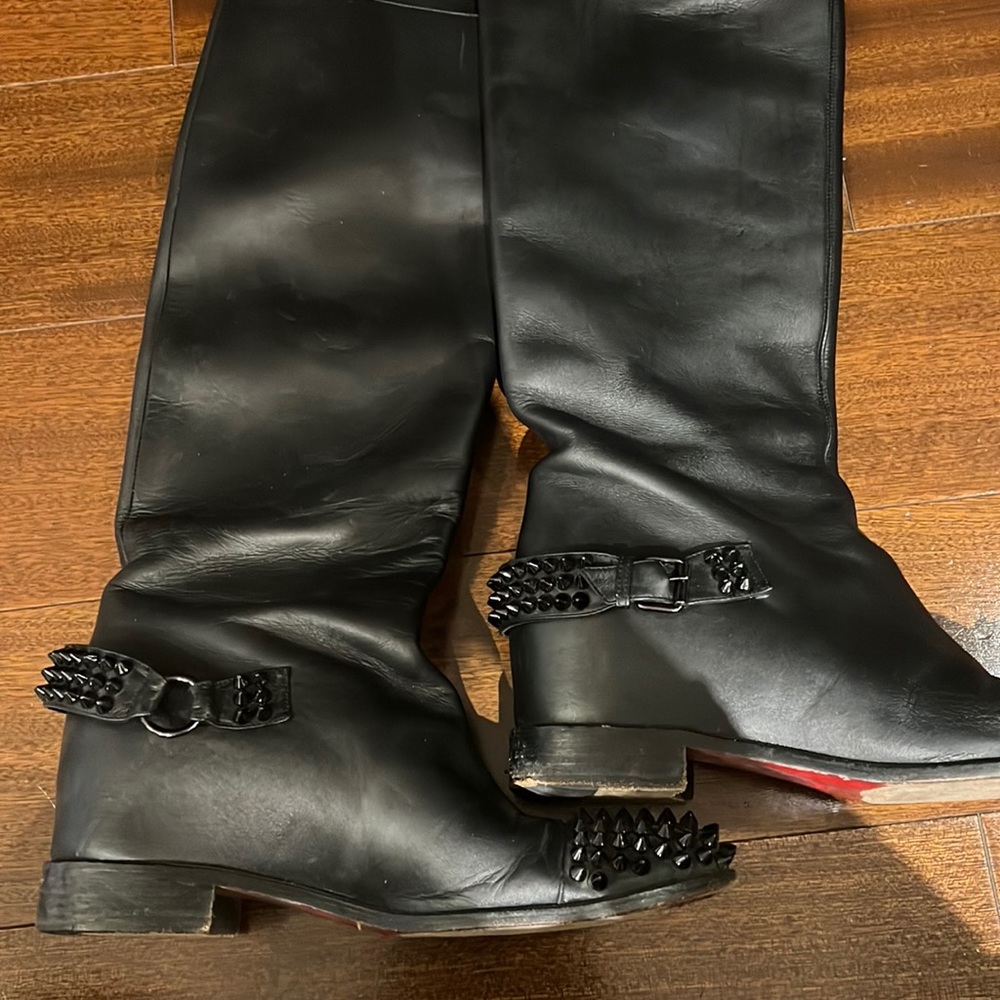 Christian Louboutin's black leather studded riding boots